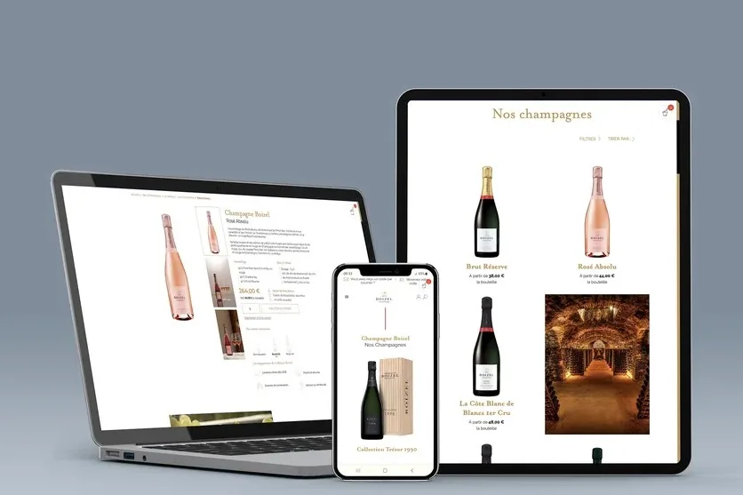 Le site Champagne Boizel sur un ordinateur portable, une tablette et un téléphone.